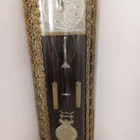 یک عدد میز تلویزیون برنز و ساعت برنز  استاده نونو