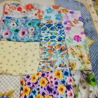مقداری پارچه و لباس فروشی|لباس|بلوک, |دیوار