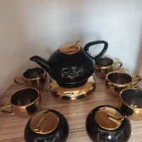 قوری وارمر با شش عدد فنجان ودو عدد قن