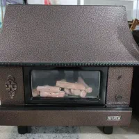 تعدادی بخاری شومینه و بخاری دیواری