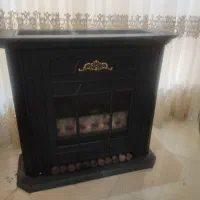 بخاری طرح شومینه توان گاز