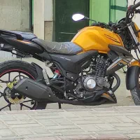 کیوجی NX150