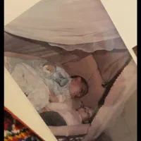 تخت کنار مادر کودک