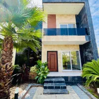 دوبلکس-حیاط-سازی-سرسبز-متریال-داخلی-مدرن