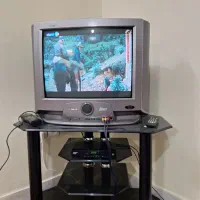 تلوزیون با میز شیشه ای