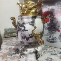 سماور نوب همراه قوری ب همراه یک تلوزیون LGمارک