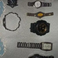 ده عدد ساعت مچی برند و یک بند امگا اصل