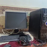 کامپیوتر با کیس و موس و کیبورد و هدست