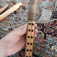 آلات موسیقی نی بوشهری|سازهای بادی|شیراز, پودنک|دیوار