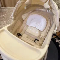 گهواره برقی و آغوشی نوزاد امیدیه