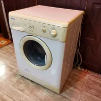 ماشین لباسشویی و فرش