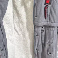 کاپشن|لباس|سلماس, |دیوار