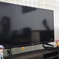 تلویزیون ۴۳ اینچ ال جی همراه با میز تی وی ترک|تلویزیون و پروژکتور|مهاباد (آذربایجان غربی), |دیوار