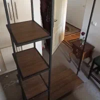 رگال لباس.جنس پایه ها فولادی.چوب استفاده شده MDF