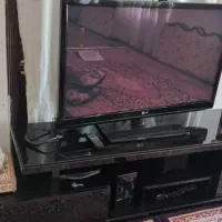 مبل تک نفره  میز تلویزیون وساعت