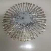 ساعت دیواری طرح خورشید