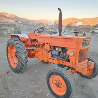 تراکتور رومانی نارنجی پرتقالی خشک
