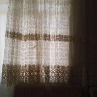 دو عدد پرده پلیسه ای همراه یک والان