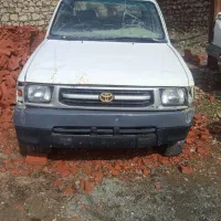 تویوتا هایلوکس دوکابین کمک دار