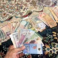 تعدادی سکه قدیمی و اسکناس قدیمی از تمام کشور ها