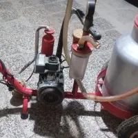 یک دستگاه شیردوش