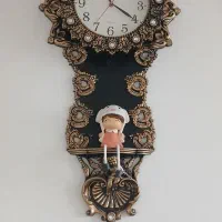 ساعت دیواری طلایی