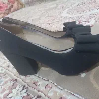 کفش و پیراهن|کیف، کفش، کمربند|تربت جام, میان جام|دیوار