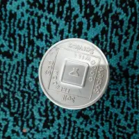 اسکناس قدیمی و سکه نقره