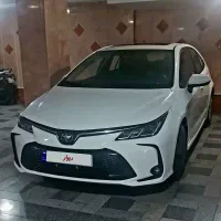 کرولا هیبرید الیت ۲۰۲۴ صفر سفید صندلی چرم