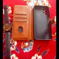 یک ساعت و کیف موبایل در حدنو ۶۰۰۰۰۰ هزارتو