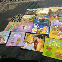 کتاب آموزش زبان وکتاب داستان وعروسک اسباب بازی