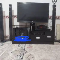 تلویزیون ال جی ۴۲ اینج همراه با میز تیوی مشکی|تلویزیون و پروژکتور|خرم‌آباد, |دیوار