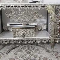 میز تلویزیون به همراه ساعت ایستاده وگنجه طرح برنز