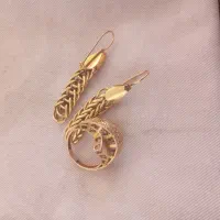 انگشتر و گوشواره طلا  ۲۰۰  خام