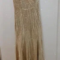 تعدادی لباس|لباس|مهاجران, |دیوار