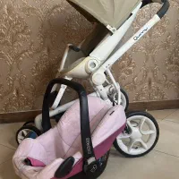 کریر و کالسکه مکسی کوزی کویینی