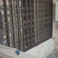 درب اکاردئونی تمام لوزی