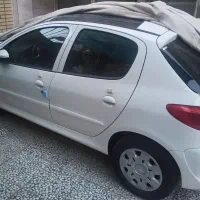 پژو 207  پاناروما tu5 ارتقاع یافته / قالپاق