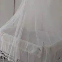 گهواره کنارتخت مادر