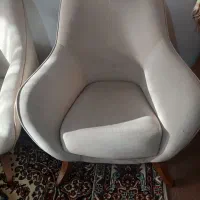 میز اتو و بلند گو تلویزیون و مبل تک نفره