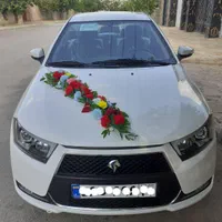 اجاره کرایه ماشین عروس دنا پلاس سفید گل آرایی عروس