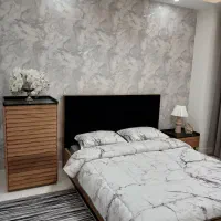 تخت خواب دونفره همراه با دراور و میز آرایش