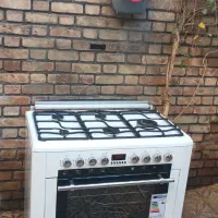 اجاق گازفردار سینجر ایتالیا درحدنو مجهز به کانوکشن|اجاق گاز و لوازم برقی پختوپز|تهران, کاج|دیوار