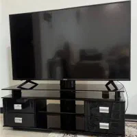 میز تلویزیون شیشه ای ۴ کشو