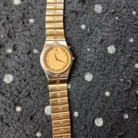 یکعدد ساعت مردانه بند استیل ضد اب طلایی رنگ