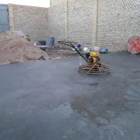 بتن ریزی با ماله پروانه ای