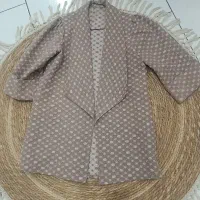 تعدادی مانتو و کیف