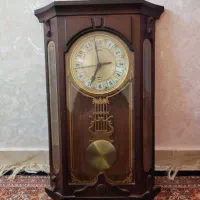 ساعت دیواری آونگ دار
