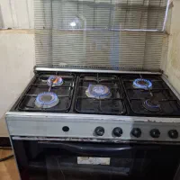 گاز پنج شعله طرح فر صفحه مشکی بدنه نقره ای|اجاق گاز و لوازم برقی پخت‌وپز|گنبد کاووس, |دیوار