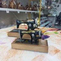 چرخ خیاطی سفالی،چوبی